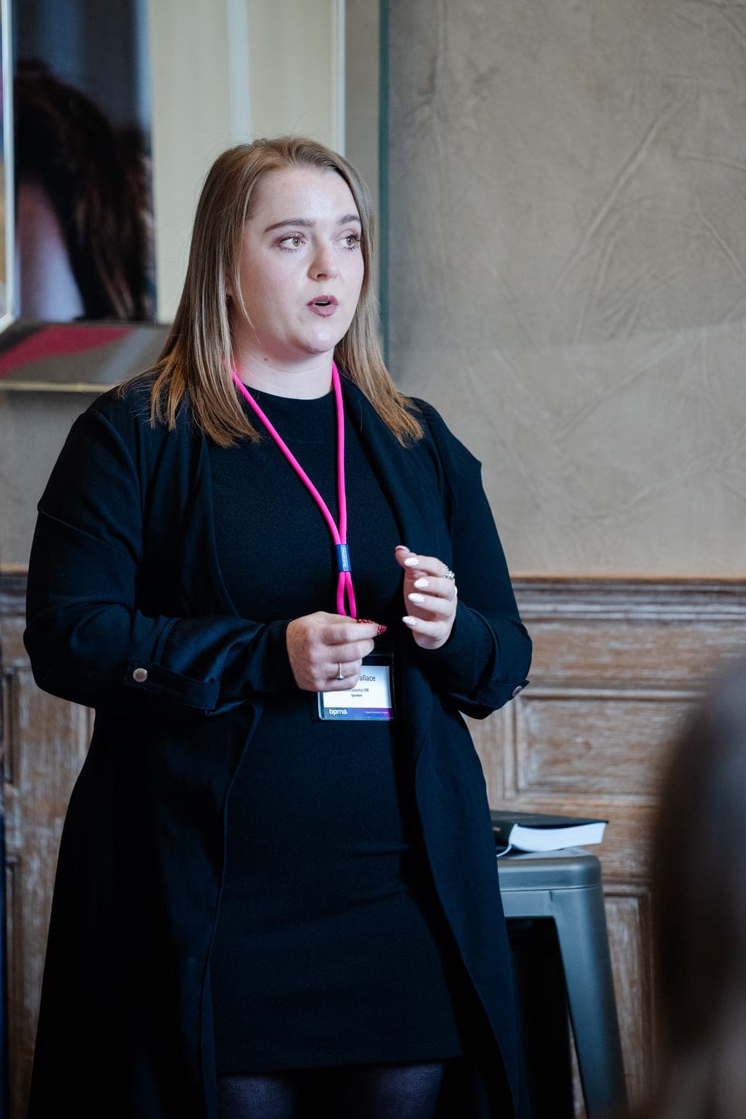 Chloe Wallace delivering a conference session
